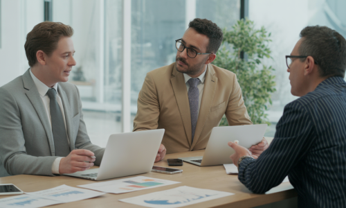 three professional men in business attire